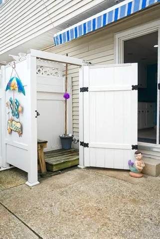 a living room with a couch and a stove