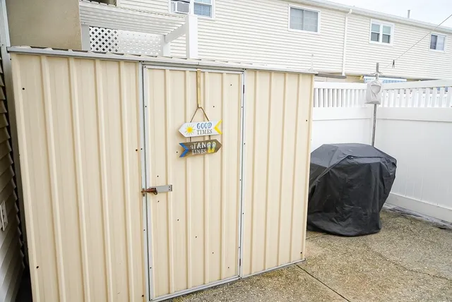 a close view of a chair and table in the back