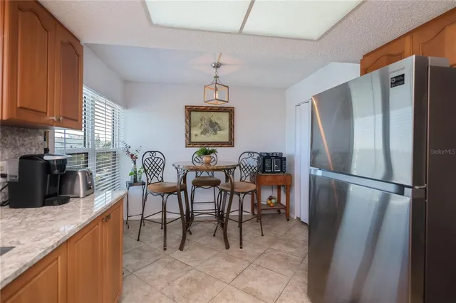 $650,000 | 1001 Benjamin Franklin Drive, Unit 406, Sarasota, FL 34236