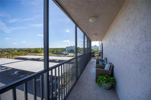 $650,000 | 1001 Benjamin Franklin Drive, Unit 406, Sarasota, FL 34236