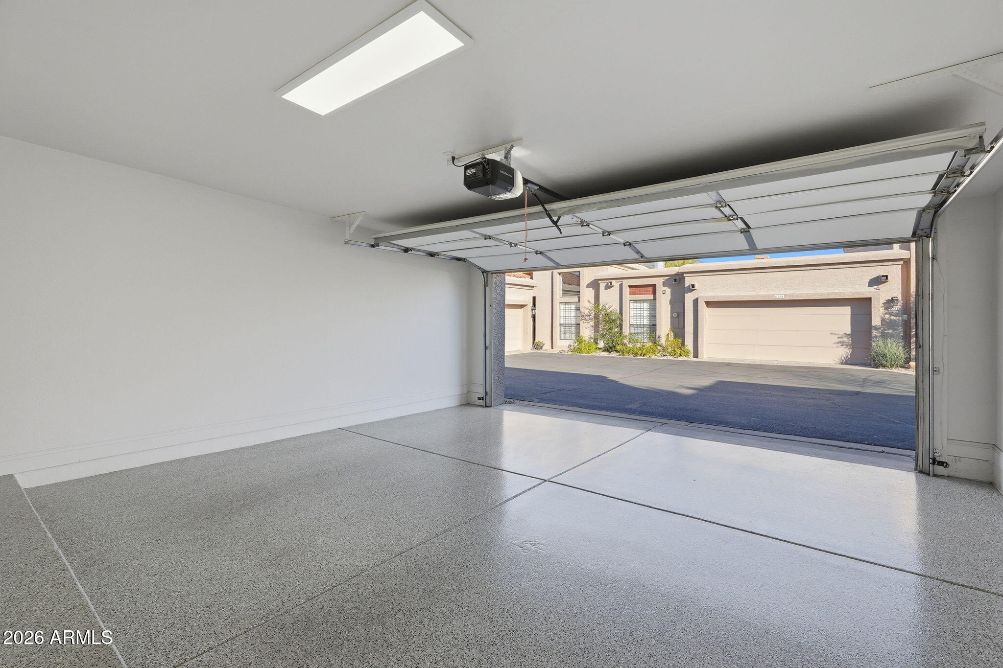6322 North 19th Street Phoenix, AZ 85016 - Photo 35 of 47 Epoxy flooring/new garage door