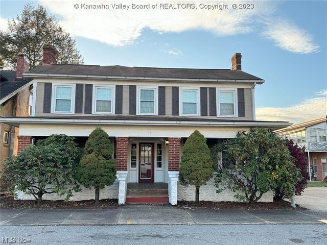 130 Virginia Street Ravenswood, WV 26164 - Photo 1 of 1 View of front of home with covered porch