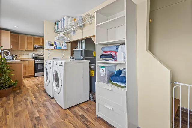 a utility room with washer and dryer