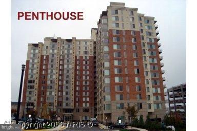 2726 Gallows Road, Unit 1416 Vienna, VA 22180 - Photo 1 of 22 a building with a street sign broad