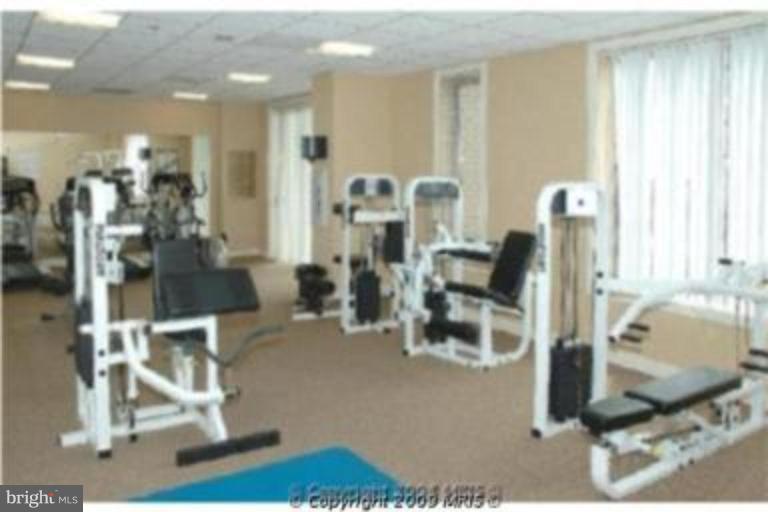 2726 Gallows Road, Unit 1416 Vienna, VA 22180 - Photo 12 of 22 a view of a room with gym equipment