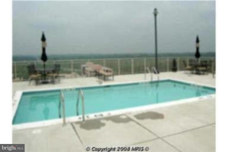2726 Gallows Road, Unit 1416 Vienna, VA 22180 - Photo 19 of 22 a view of a swimming pool
