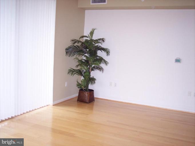 2726 Gallows Road, Unit 1416 Vienna, VA 22180 - Photo 3 of 22 a view of a small space with potted plants