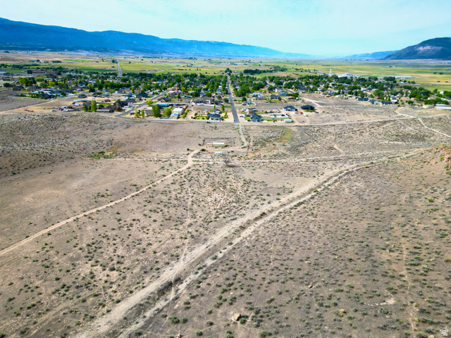 600 East E Street Moroni, UT 84646 - Photo 22 of 38 Expansive undeveloped land with visible dirt paths