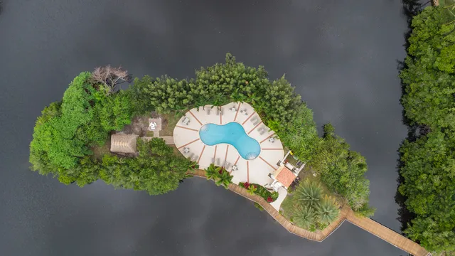 a view of a swimming pool with a patio