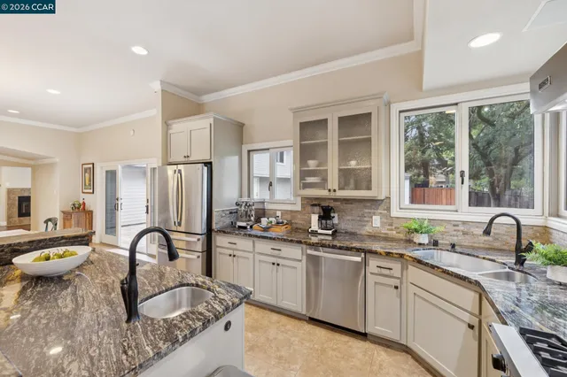 a view of a livingroom with furniture and a chandelier