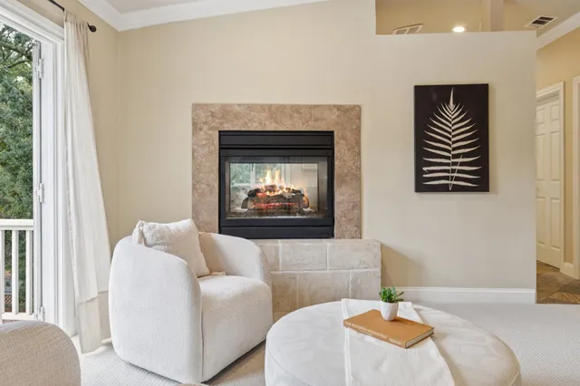 a view of balcony with wooden floor and fence