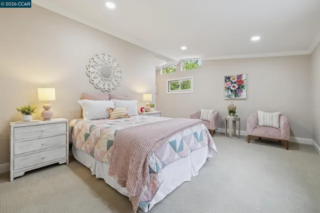 a view of a livingroom with workspace and a couch