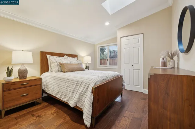 a view of backyard of house with seating space