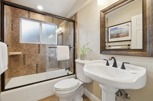 a view of a backyard with chairs