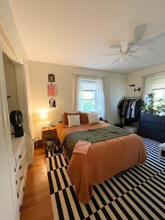 a bedroom with a bed and furniture