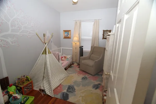 a bathroom with a shower and toilet