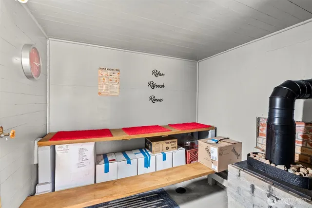 a bedroom with furniture and a book shelf