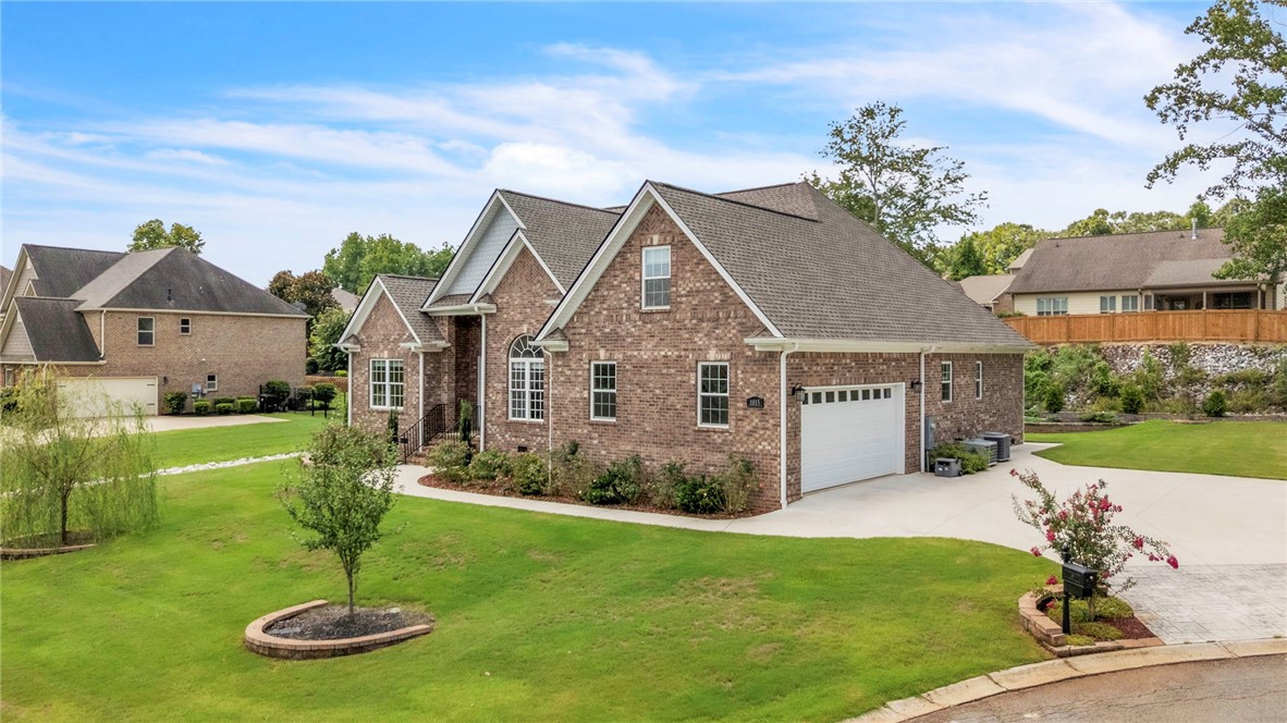 1015 Winmar Drive Anderson, SC 29621 - Photo 2 of 49 This classic brick residence features a spacious front yard and an attached garage.