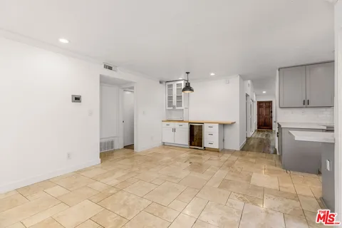 a view of a kitchen with a sink