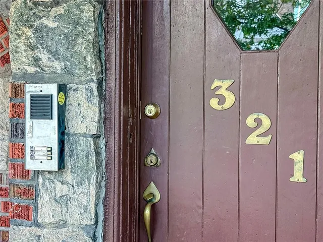 a living room with furniture rug and window