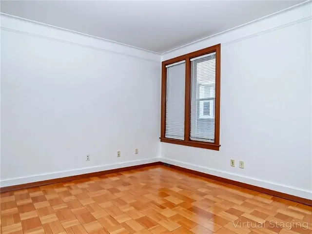 a kitchen with stainless steel appliances a sink stove and cabinets