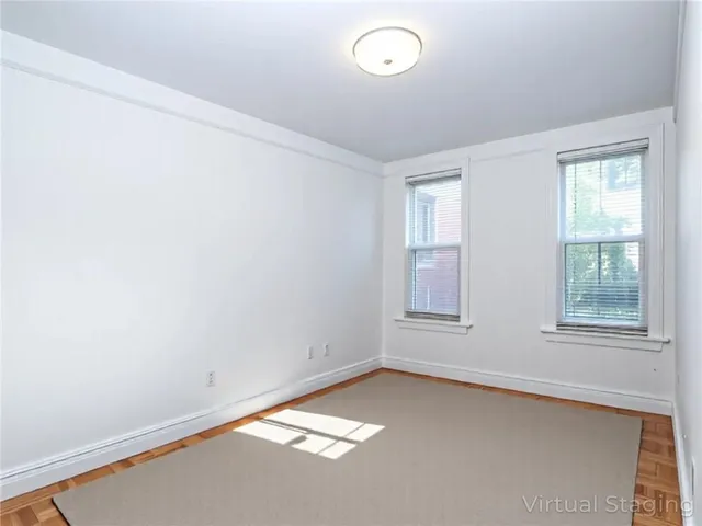 a bathroom with a sink a toilet and a shower