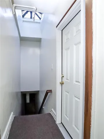 a utility room with cabinets