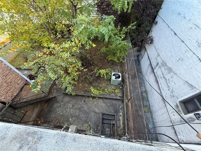 a view of a balcony with an outdoor space