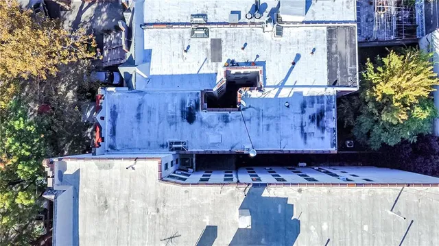 a view of a building with a street