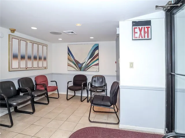 a room with furniture and air hockey table