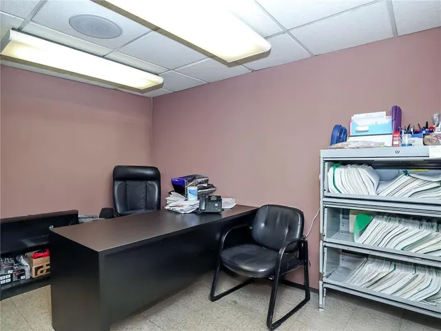 a room with furniture and a chair