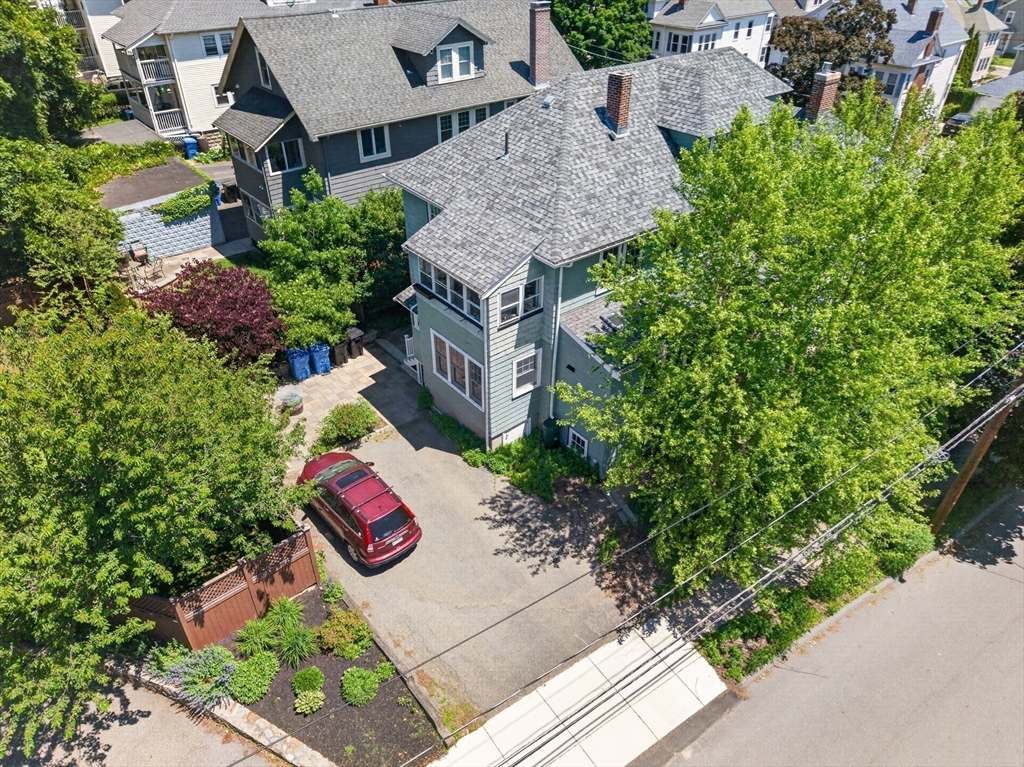76-78 Lewis Road Belmont, MA 02478 - Photo 35 of 36 an aerial view of residential house with outdoor space and trees all around