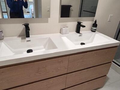 1420 Ocean Way, Unit 32C Jupiter, FL 33477 - Photo 14 of 22 a bathroom with a sink and a mirror