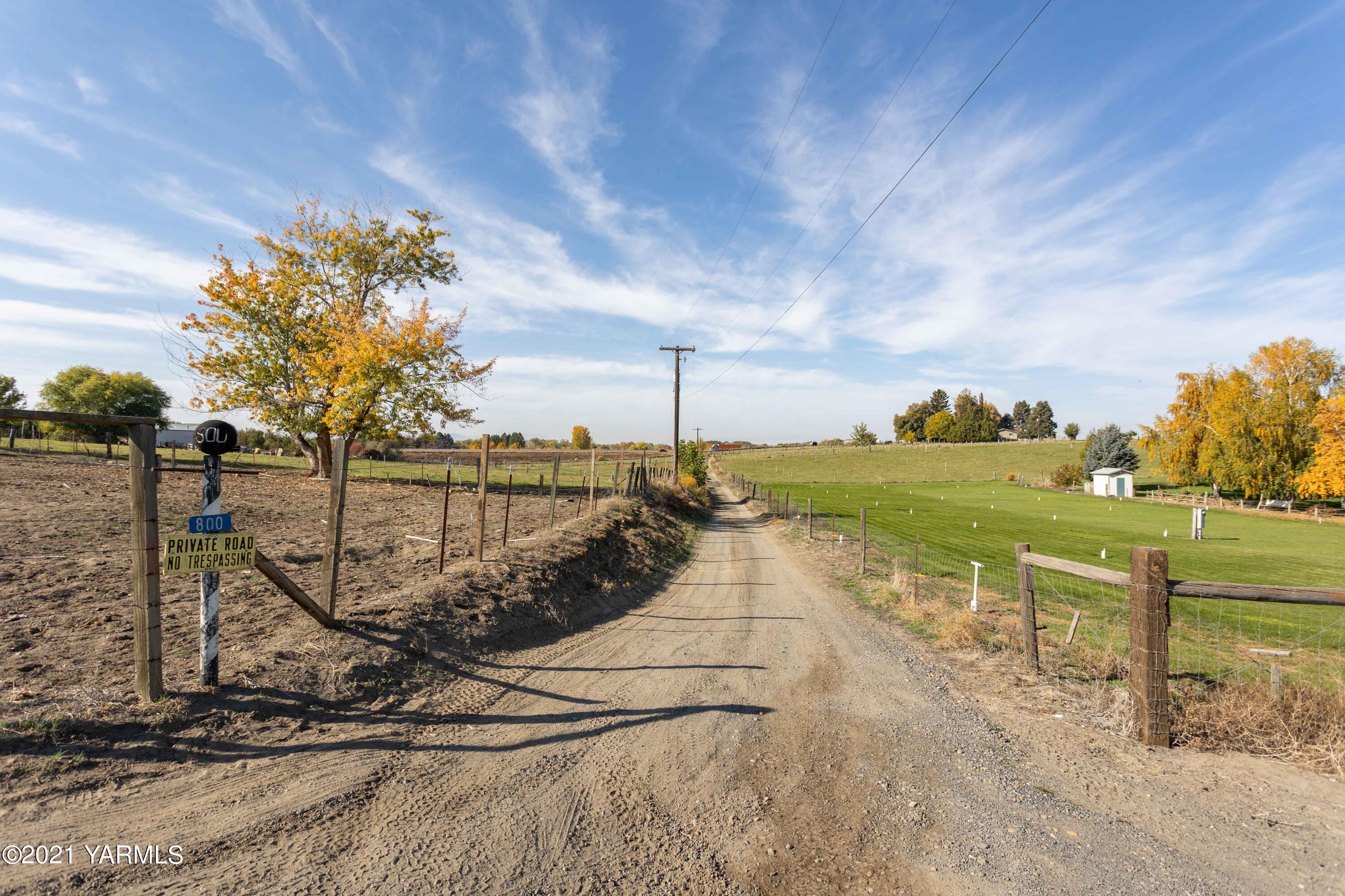 800 Blaine Road Granger, WA 98932 - Photo 20 of 43 a view of a lake with a big yard