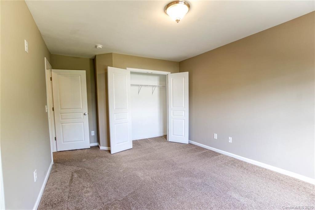 2515 Fossil Stone Lane Fort Mill, SC 29708 - Photo 18 of 37 an empty room with closet area