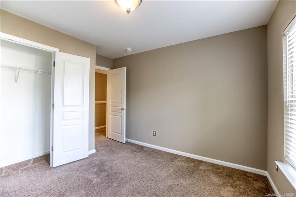 2515 Fossil Stone Lane Fort Mill, SC 29708 - Photo 23 of 37 an empty room with closet