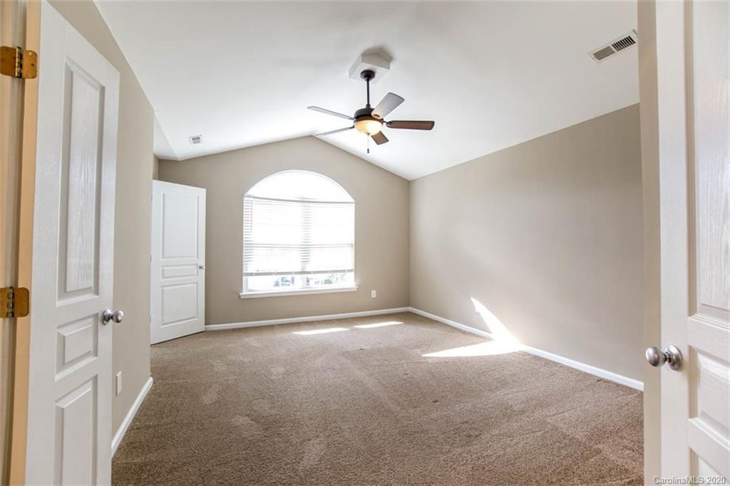 2515 Fossil Stone Lane Fort Mill, SC 29708 - Photo 25 of 37 a view of an empty room with a window