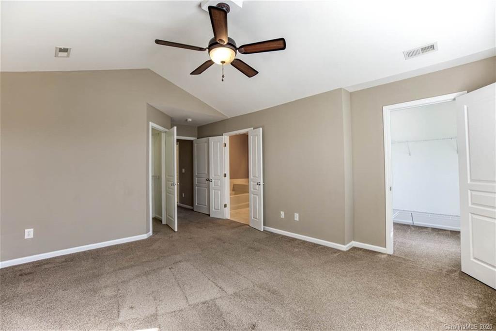 2515 Fossil Stone Lane Fort Mill, SC 29708 - Photo 27 of 37 a view of room with ceiling fan
