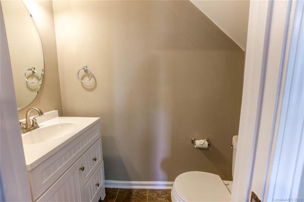 2515 Fossil Stone Lane Fort Mill, SC 29708 - Photo 7 of 37 a bathroom with a sink toilet and vanity