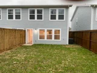 a house view with a garden space