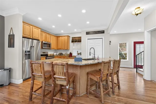 a bed room with a bed and a chair