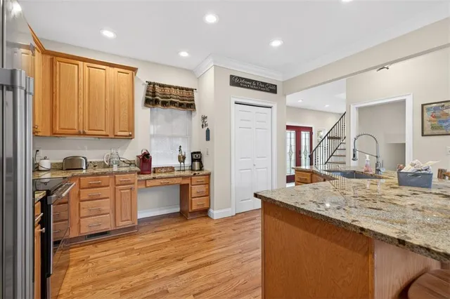 a bathroom with a bathtub and a toilet