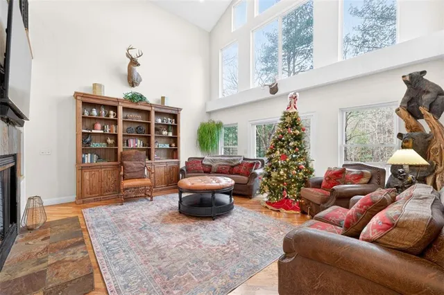 a bedroom with furniture and a flat screen tv
