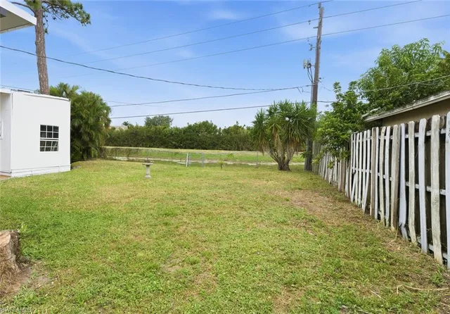 a view of a yard with an outdoor space