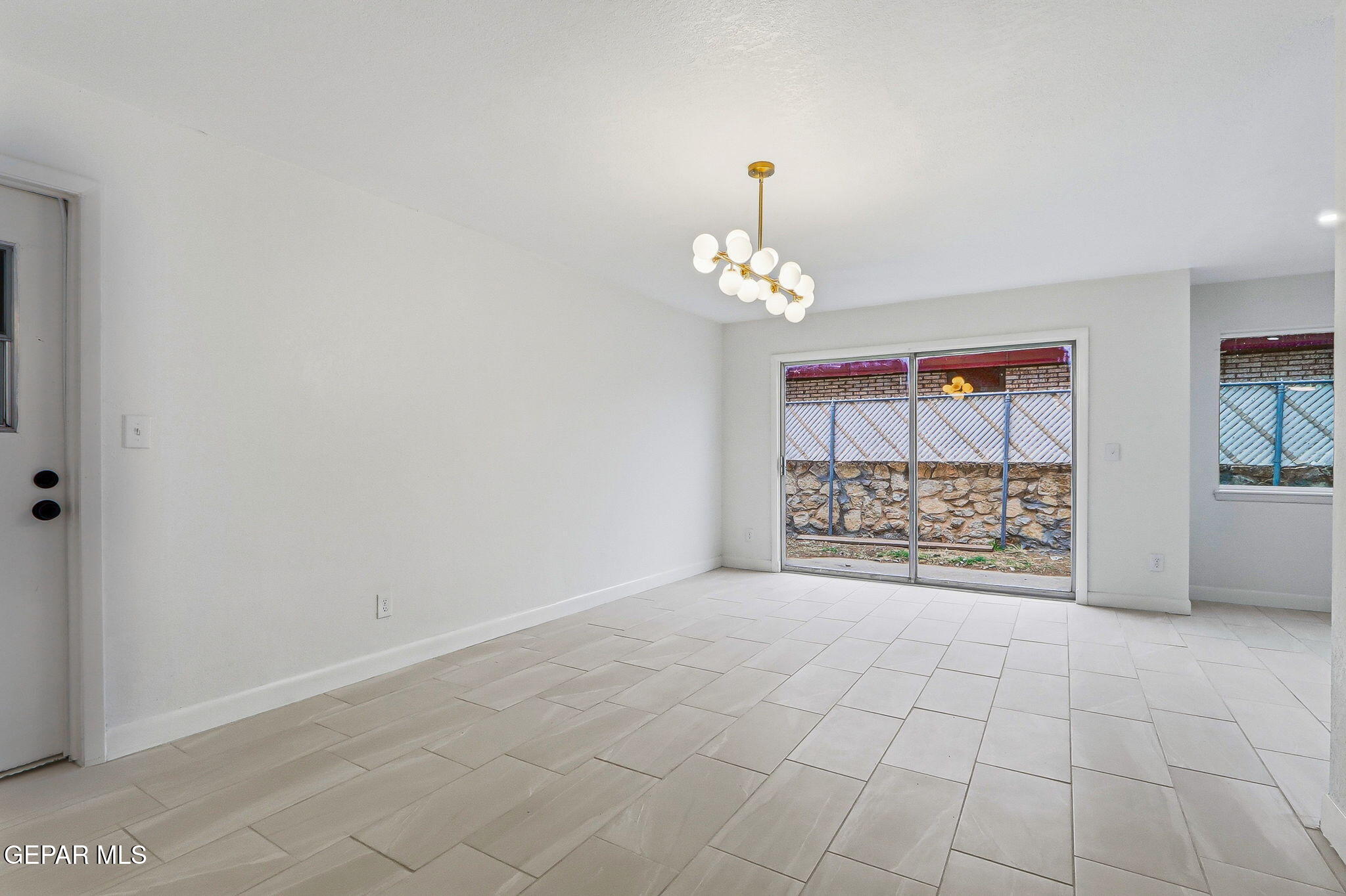 709 Frontera Road El Paso, TX 79922 - Photo 7 of 41 a view of an empty room with a window