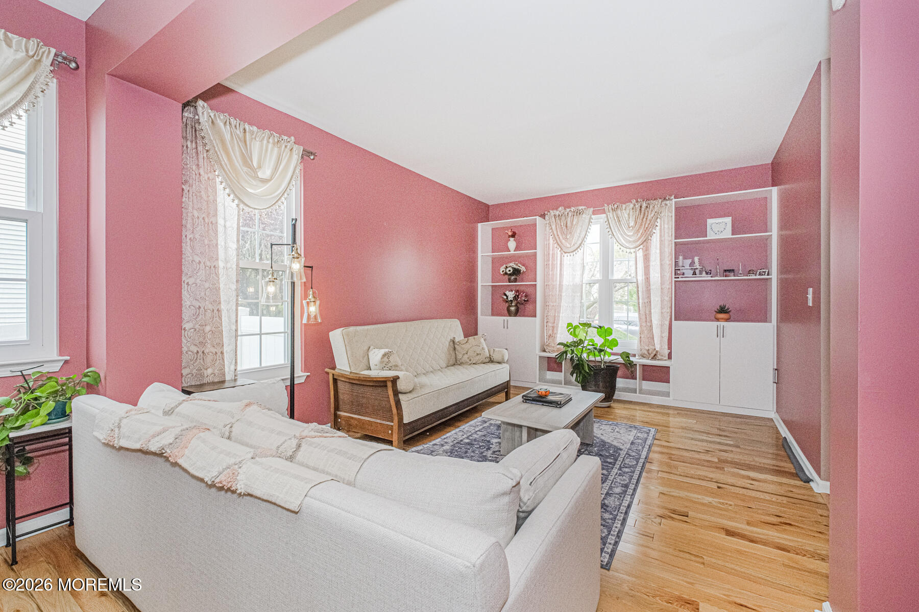 315 Wedgewood Road Morganville, NJ 07751 - Photo 7 of 37 a living room with furniture and a potted plant