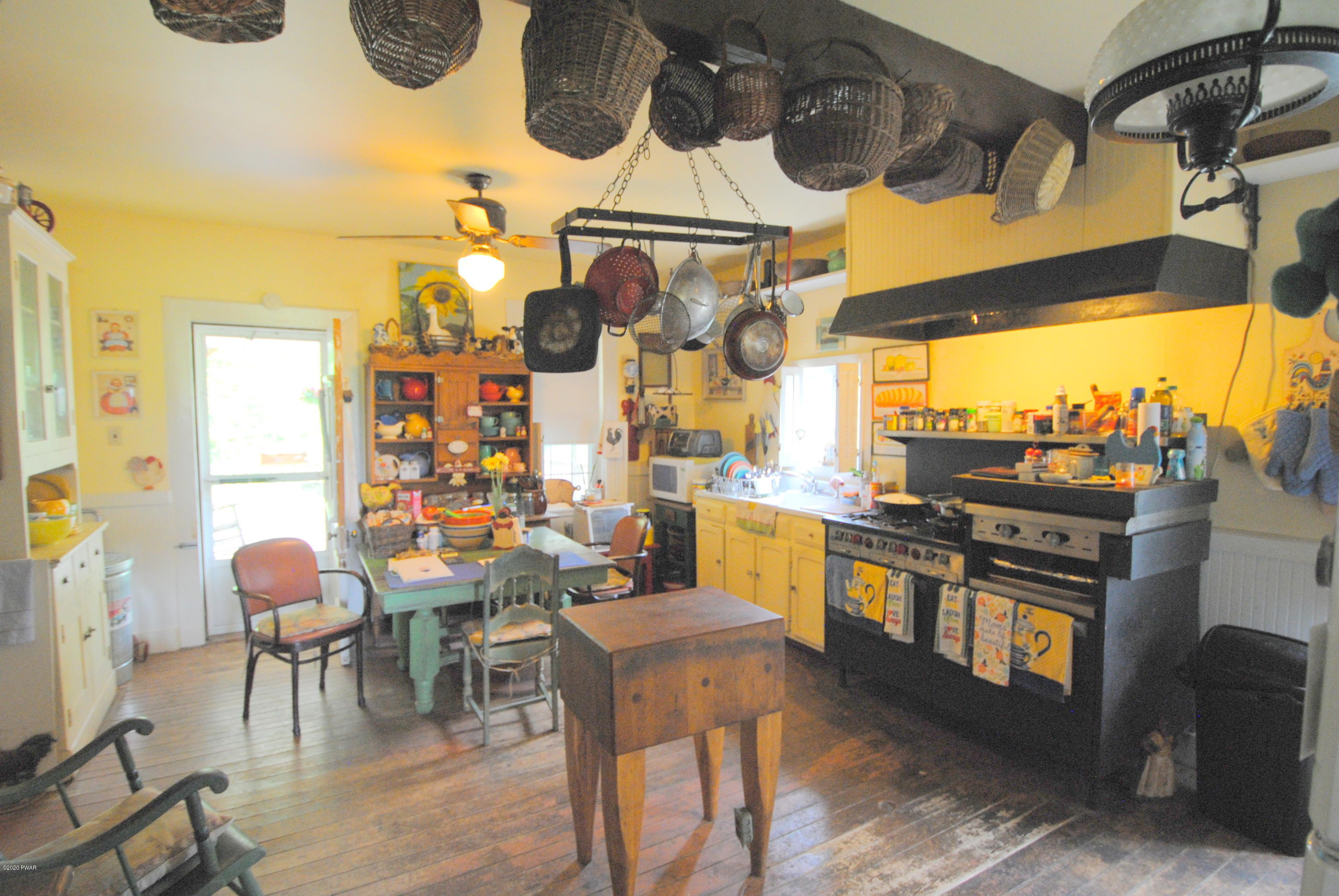 313 Old Racht Road Waymart, PA 18472 - Photo 10 of 39 a view of a dining room with furniture window and outside view