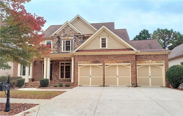 front view of a house with a yard