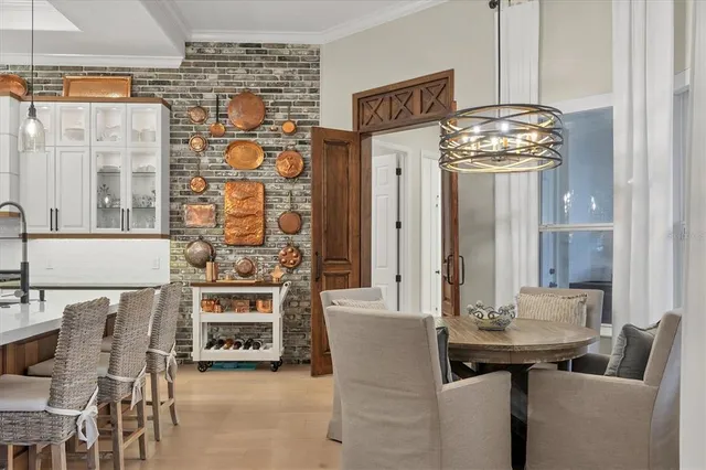 a bedroom with a large bed couch and a window