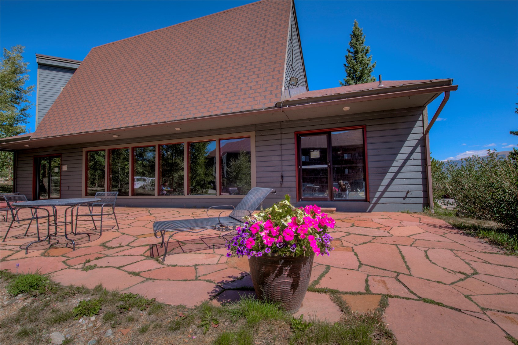 94300 Ryan Gulch Road, Unit 301 Silverthorne, CO 80498 - Photo 35 of 35 a front view of a house with a porch